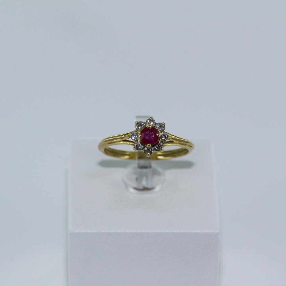 Bague petite fleur en diamant et rubis