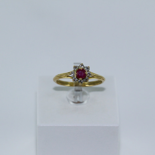Bague petite fleur en diamant et rubis