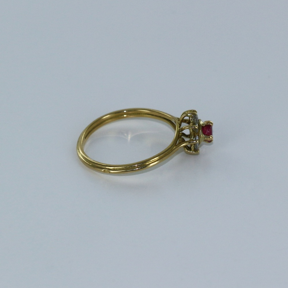 Bague petite fleur en diamant et rubis