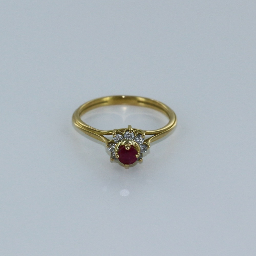 Bague petite fleur en diamant et rubis